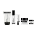 A five-piece skincare set from The Inkey List on a solid white background, including a cleanser, a serum, a toner, a cream, and a treatment jar.