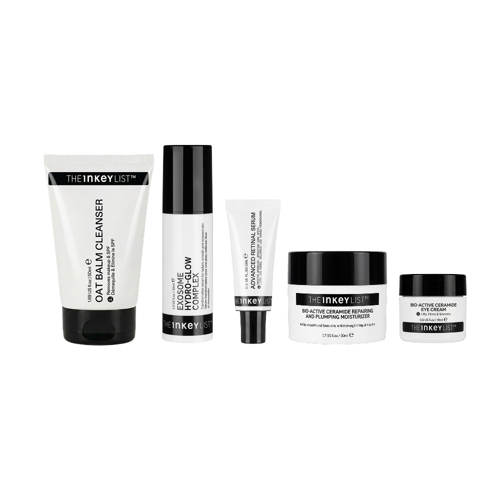A five-piece skincare set from The Inkey List on a solid white background, including a cleanser, a serum, a toner, a cream, and a treatment jar.